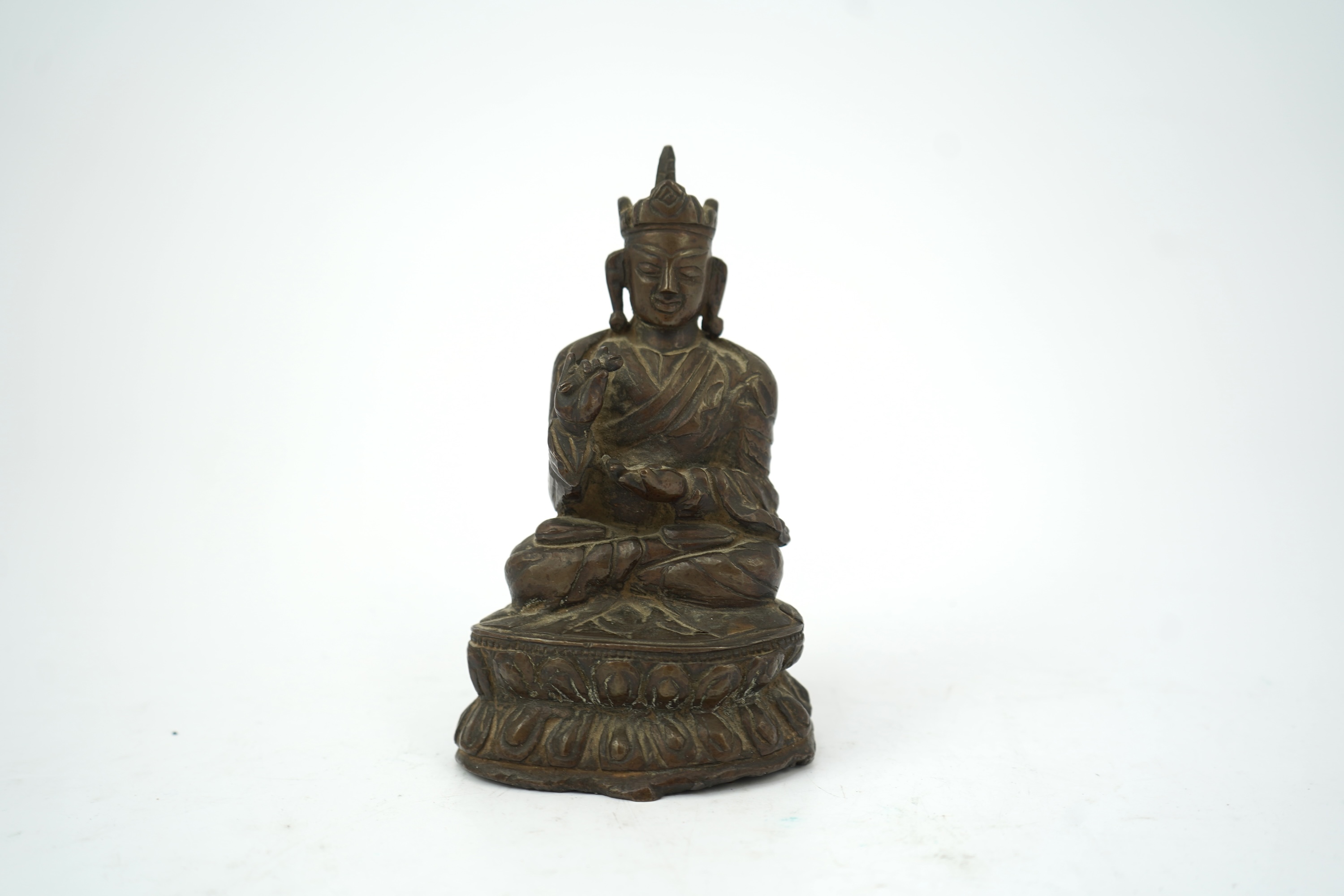 A Nepalese copper alloy figure of Vairocana, 19th century or later
